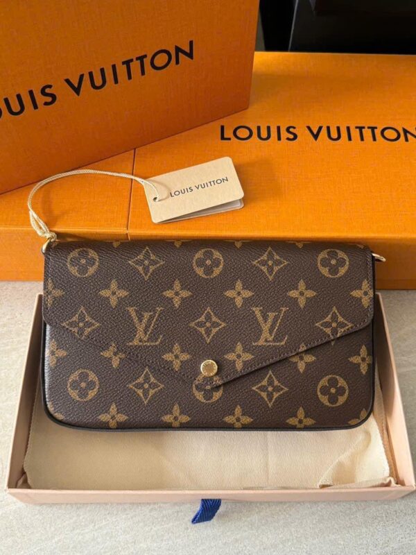 Ví cầm tay Louis Vuitton
